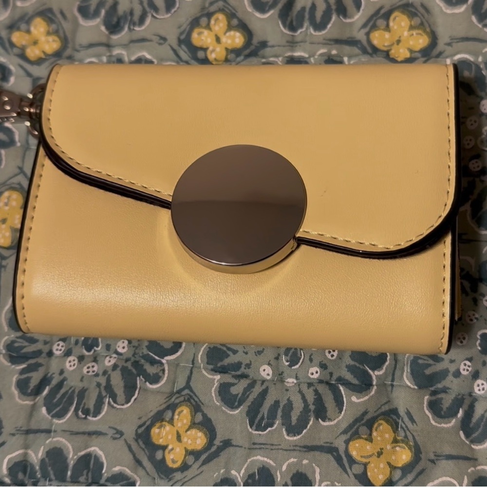 BCBGeneration yellow leather wallet/wristlet w/clip, NWOT.